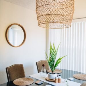 green-leafed palm plant and round white plant pot